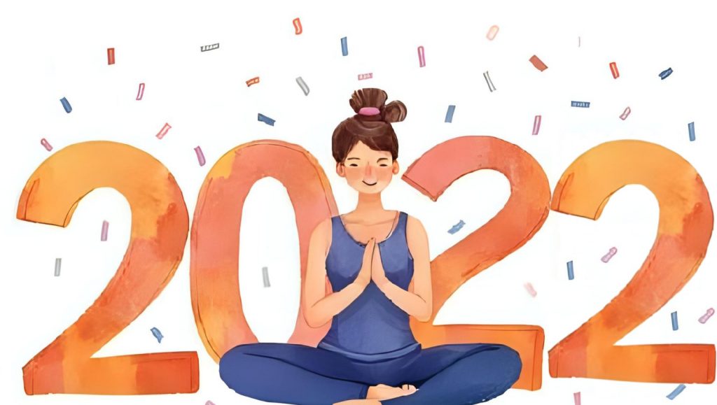 Nouvelle année 2022, Yogi avec cotillons de toutes les couleurs